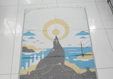 Jacquard-woven Turkish towel with seal illustration scenic design, produced as a convention gift, San Diego